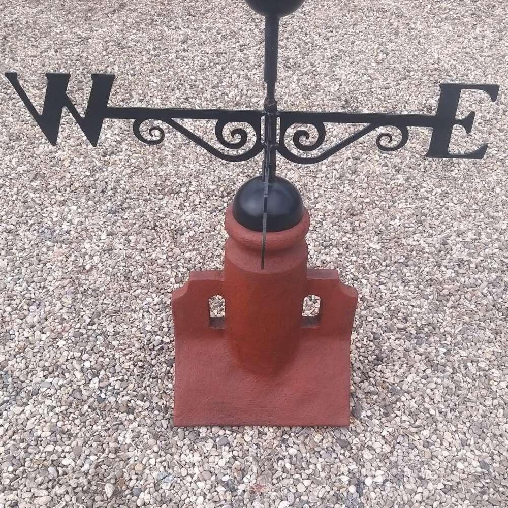 Golfer weathervane supplied on a 45 degree ridge tile finial