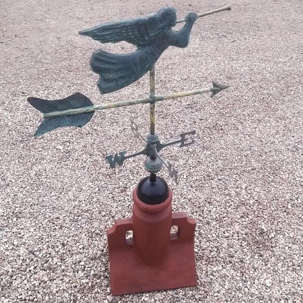 Copper verdigris angel weathervane supplied on a 45 degree ridge tile finial