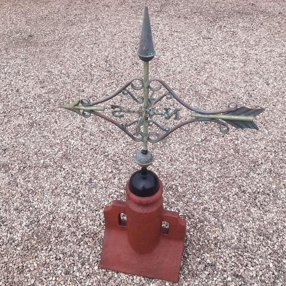 Verdigris victorian arrow weathervane supplied on a 90 degree ridge finial