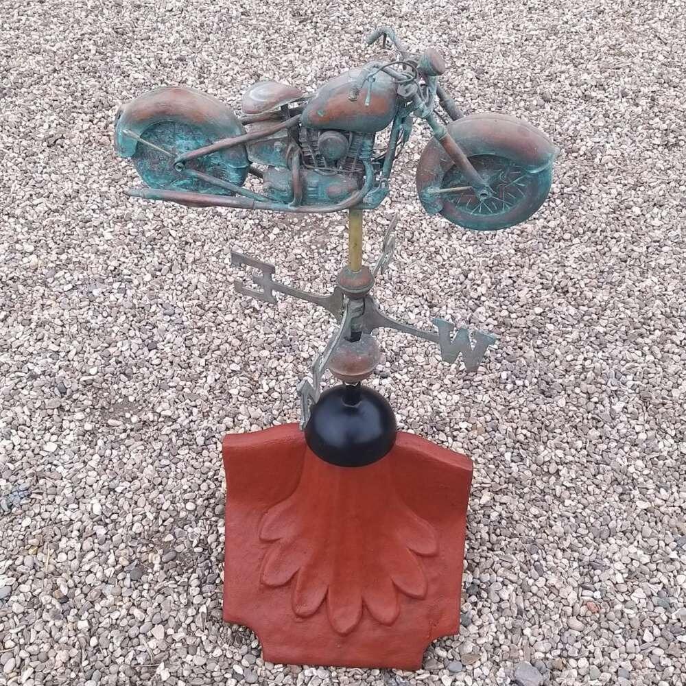 Motorbike verdigris weathervane on a ridge tile finial fitting with multiple angle options