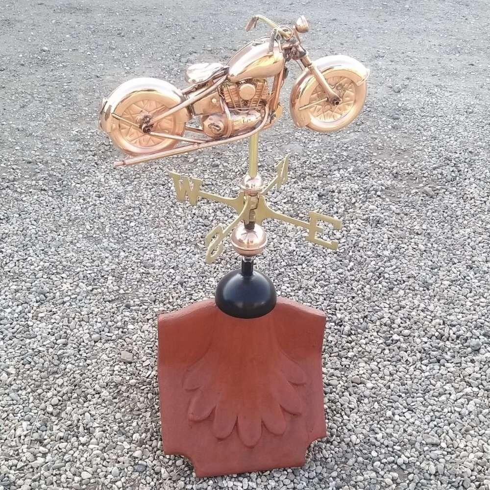 Motorbike weathervane installed on a ridge tile finial fitting with multiple angle options
