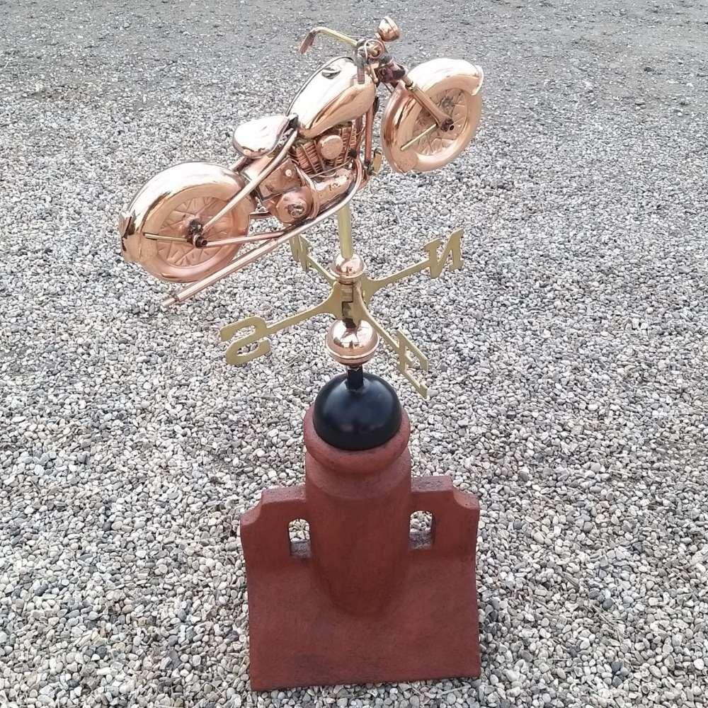 Motorbike weathervane mounted on a 90 degree ridge base finial