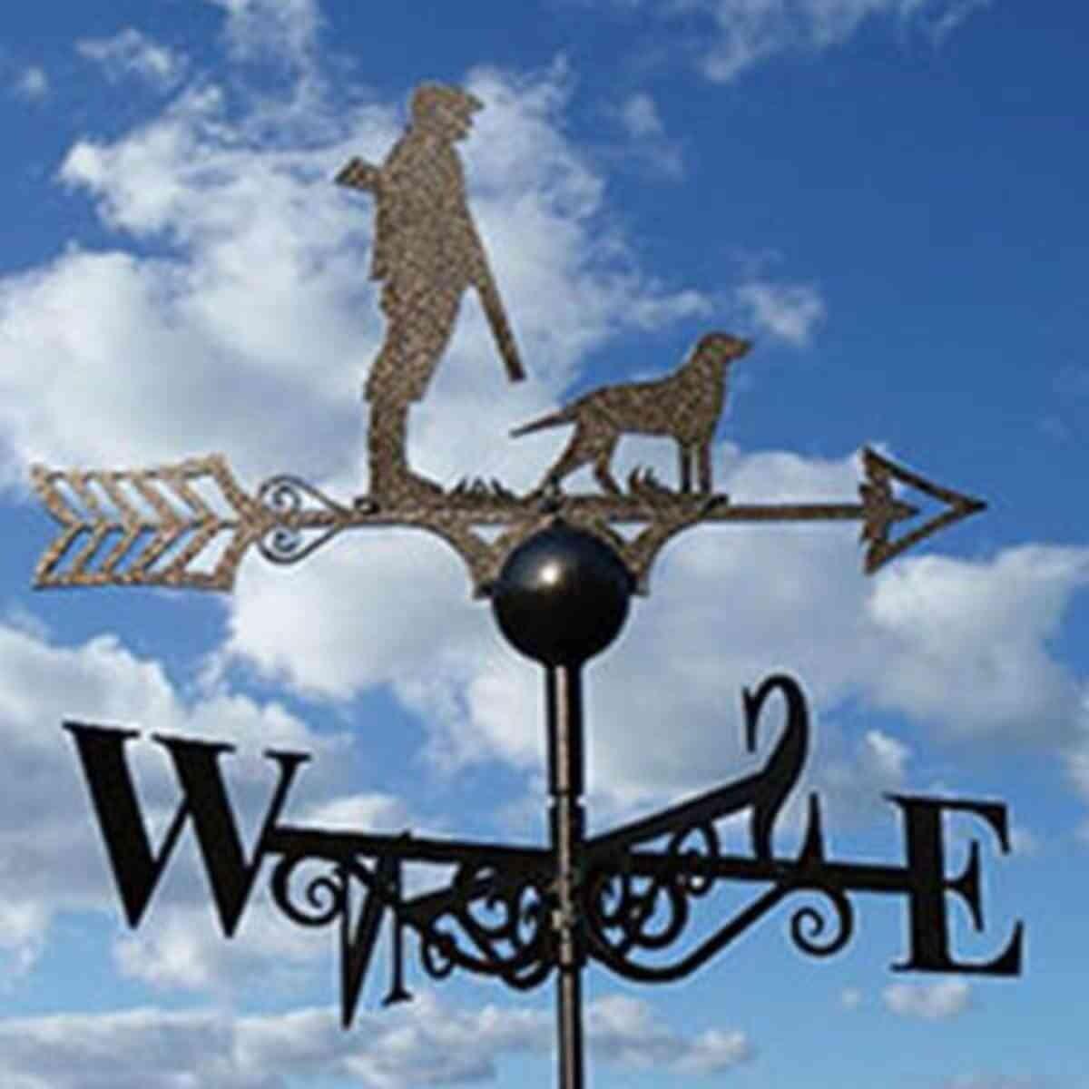 Man and dog hunting weathervane
