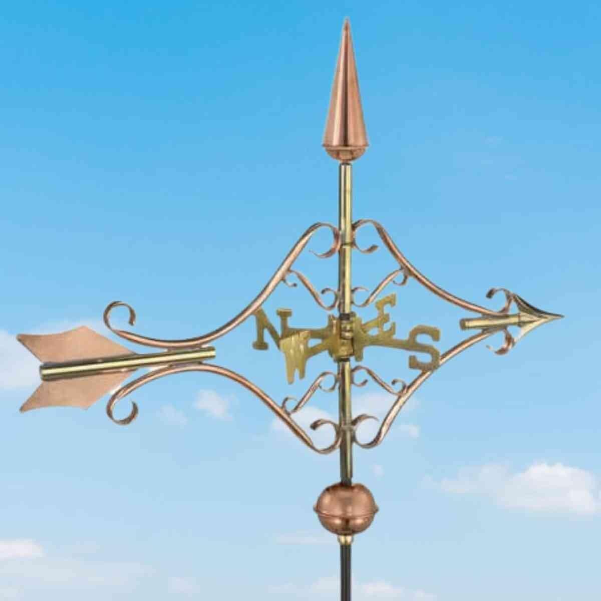Medium copper Victorian arrow weathervane product photograph showing scrolled brackets copper globes and cardinal points