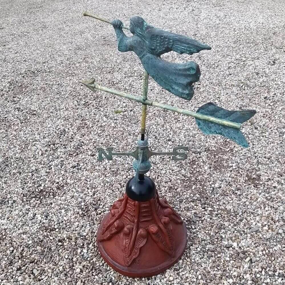 Angel weathervane supplied on a round ridge tile capping