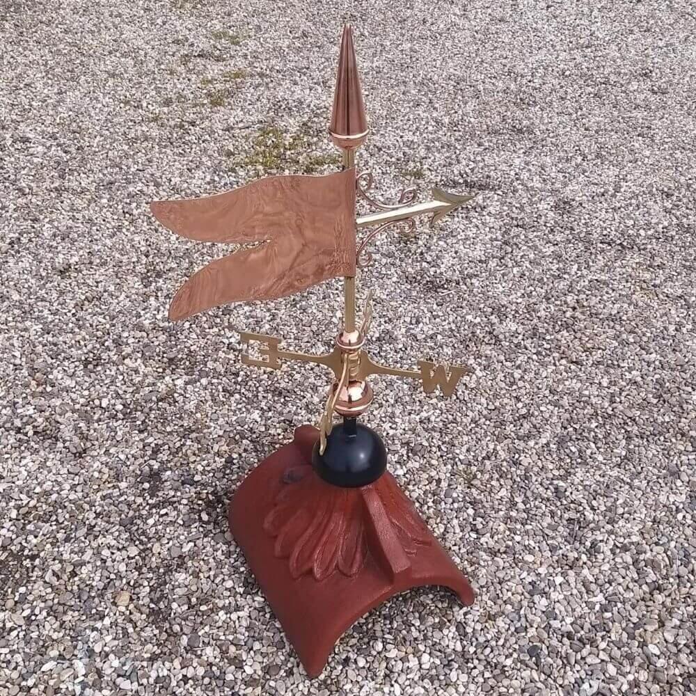 Banner weathervane fitted on a half round finial