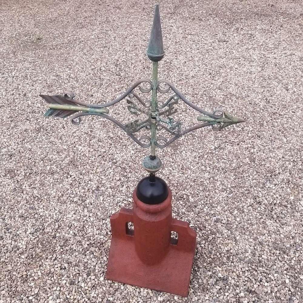 Verdigris victorian arrow weathervane supplied on a 90 degree ridge finial