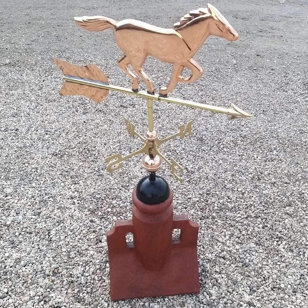 Horse weathervane mounted on a 45 degree ridge tile finial