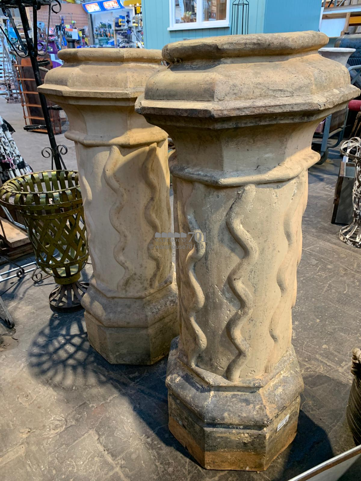 Pair of buff decorative pair of chimney pots