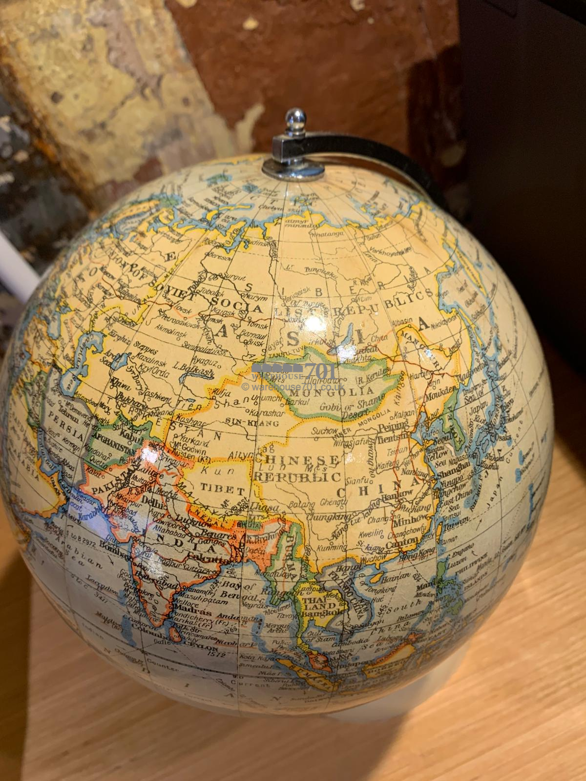 1940 8-inch chrome globe on a Bakelite base