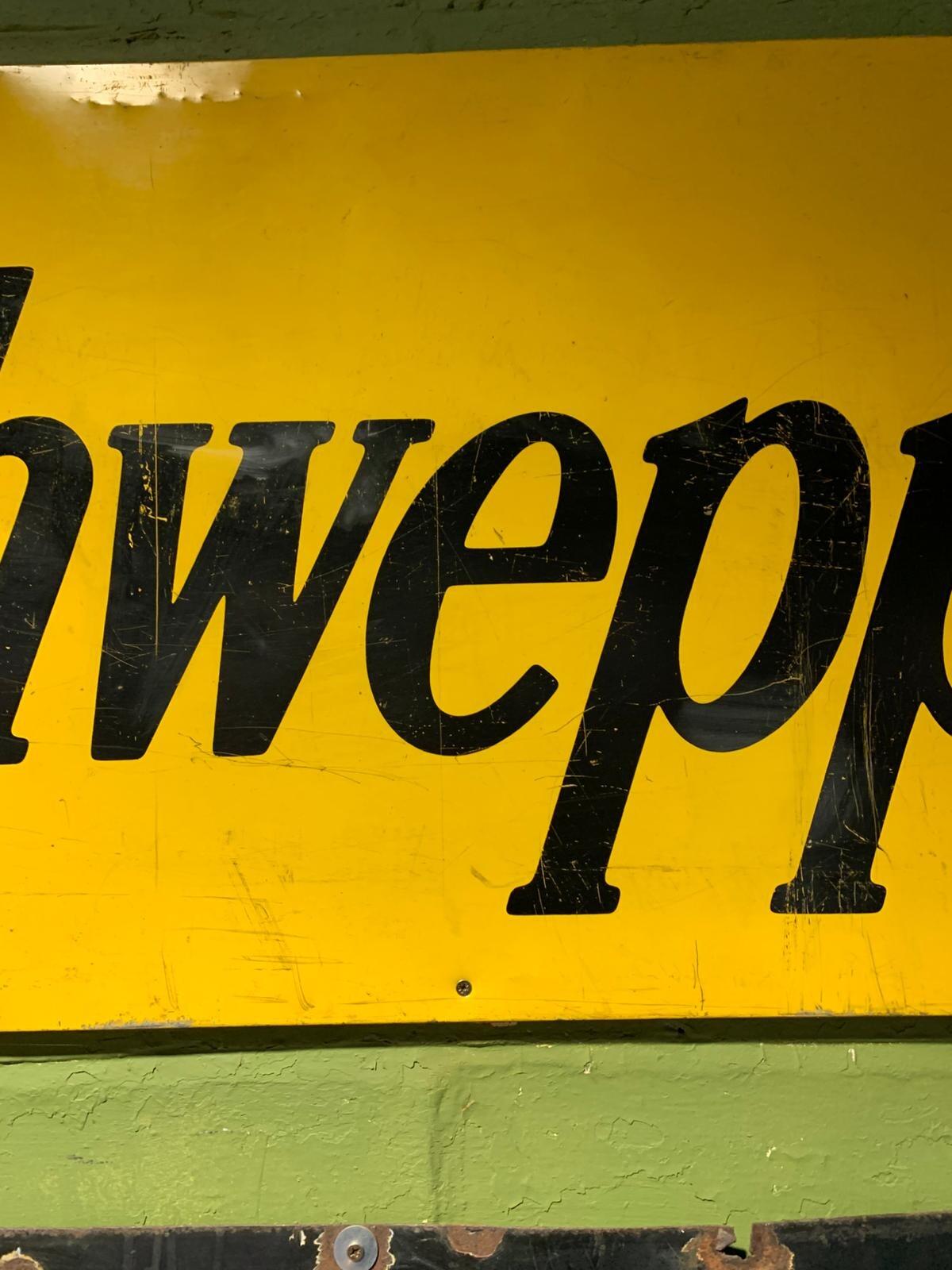 Metal Schweppes sign