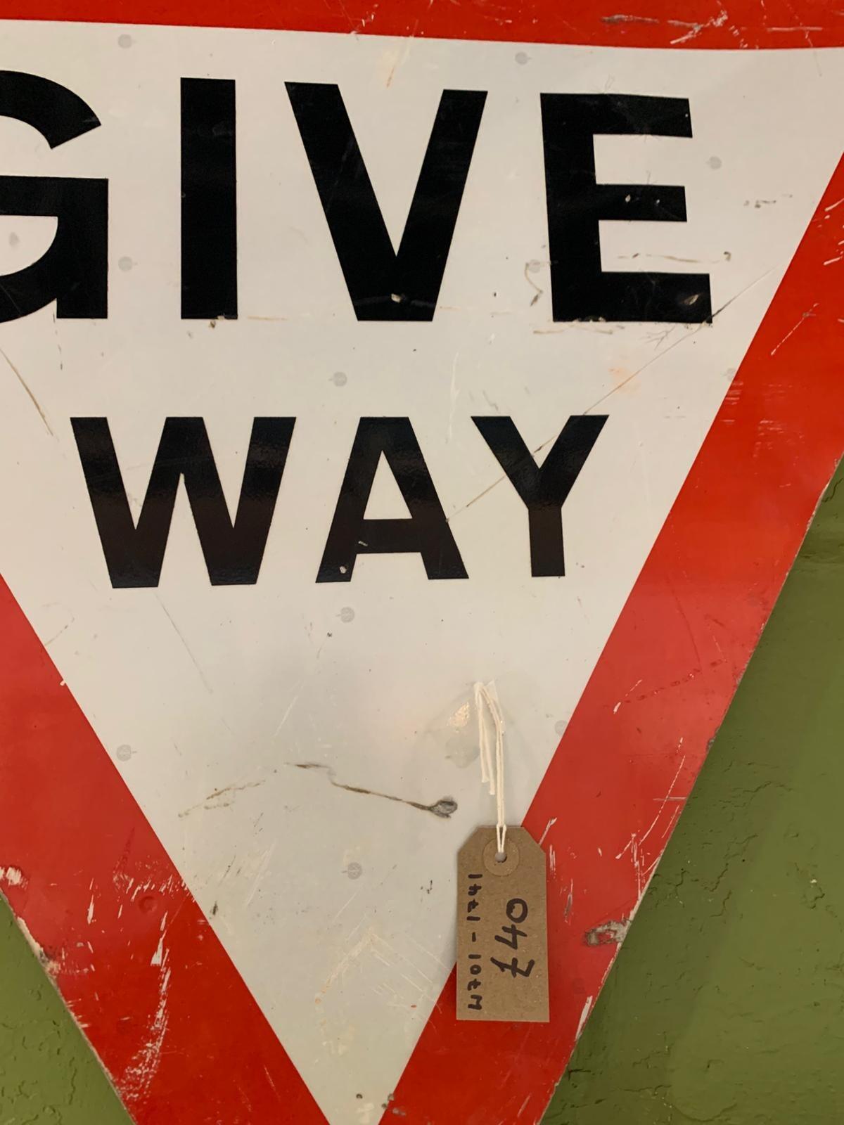Metal children crossing triangle sign