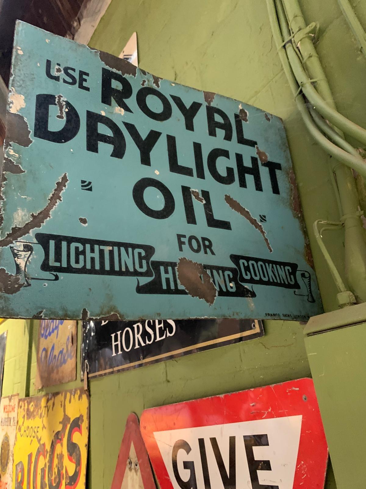 Blue metal Royal Daylight Oil sign