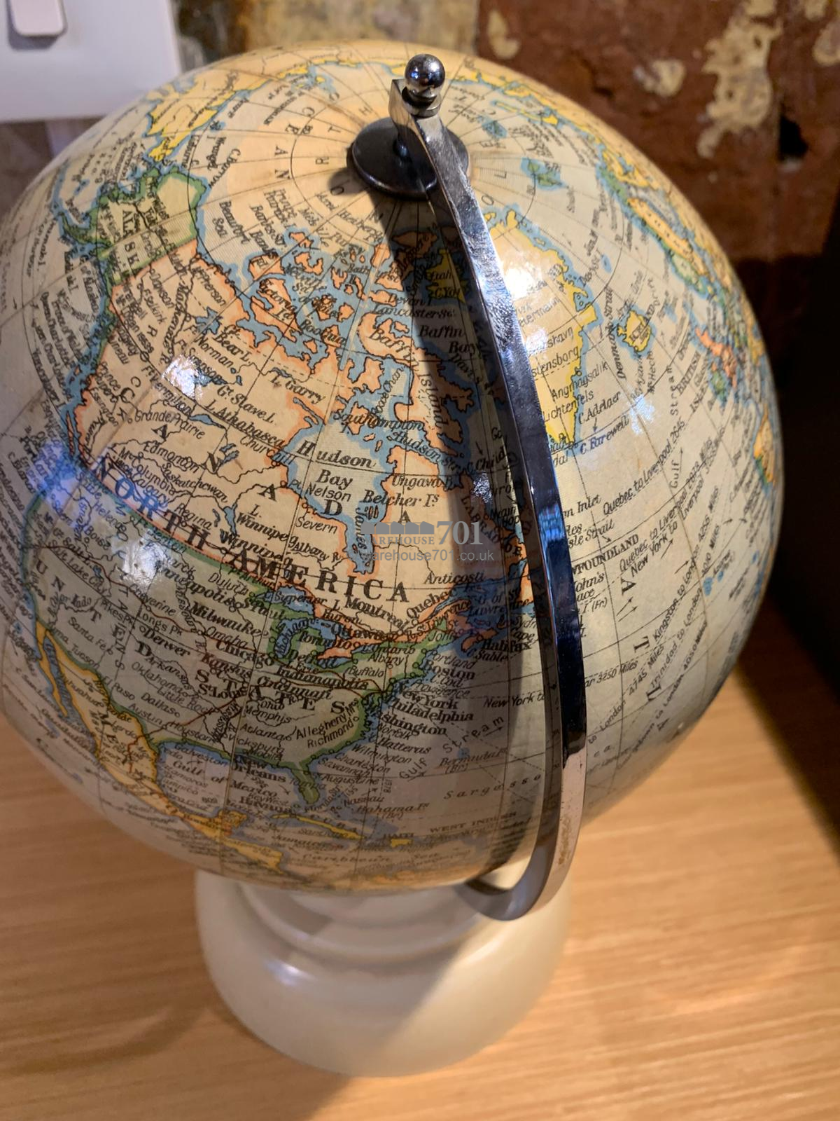 1940 8-inch chrome globe on a Bakelite base