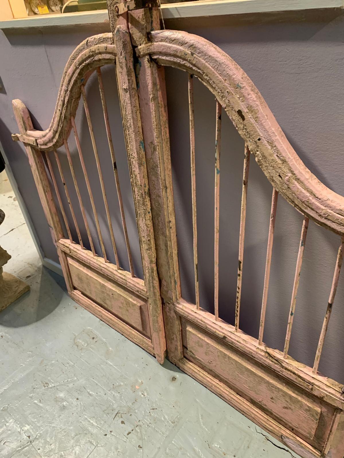 large pair of pink gates