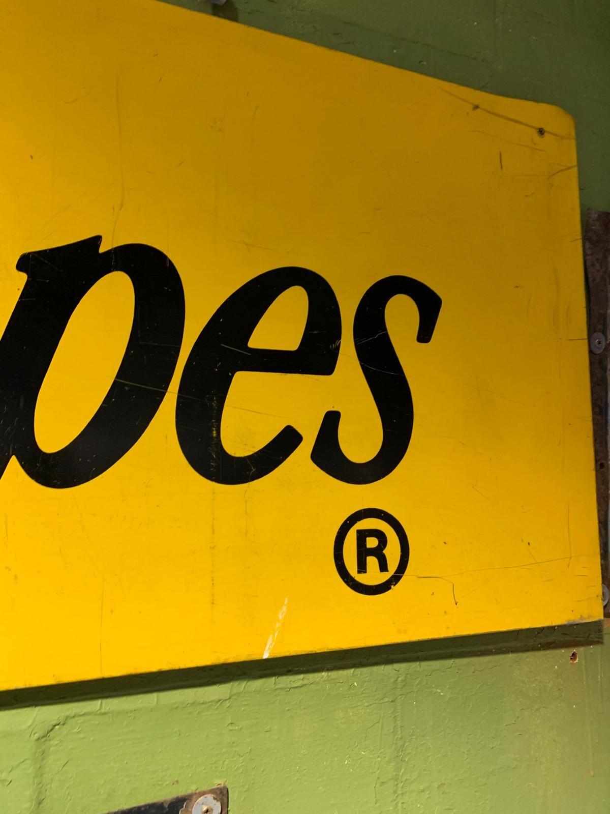 Metal Schweppes sign