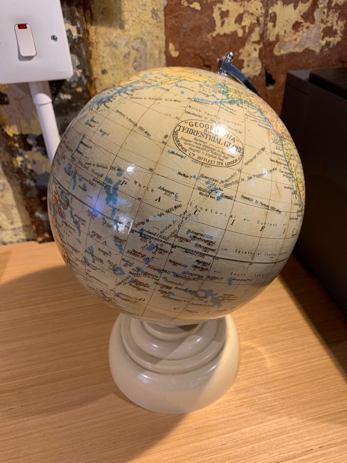 1940 8-inch chrome globe on a Bakelite base