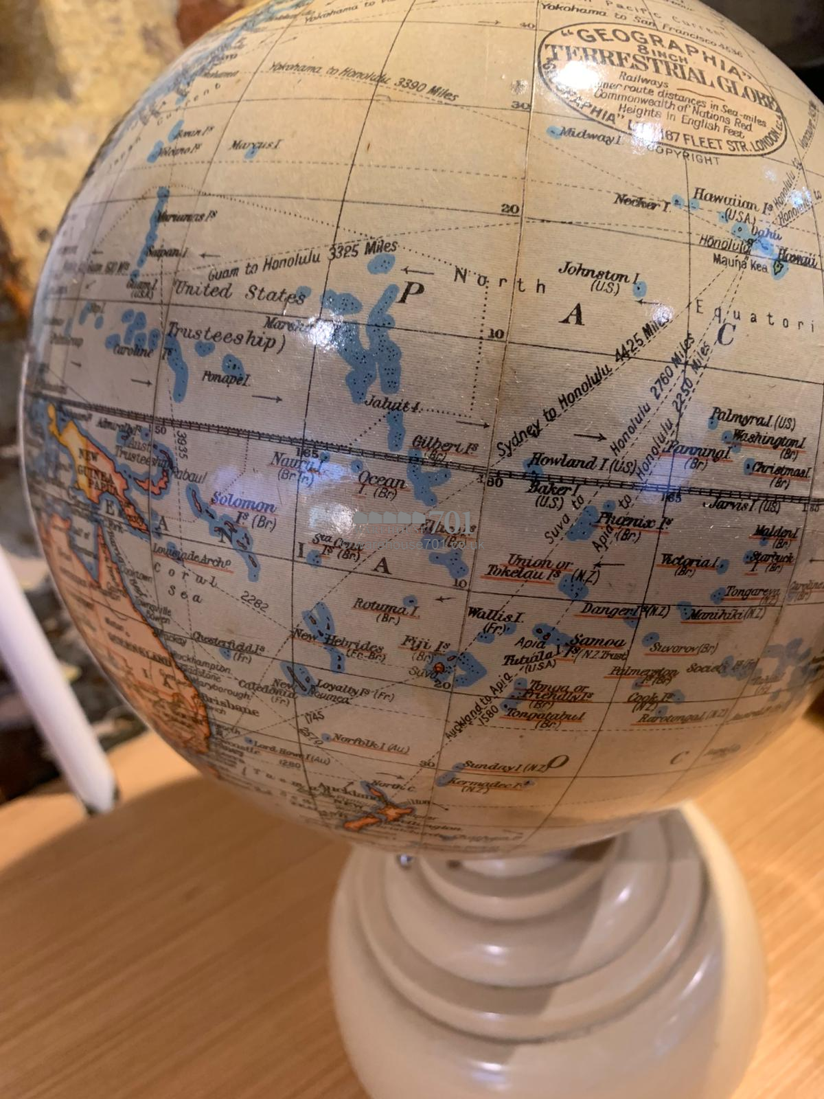 1940 8-inch chrome globe on a Bakelite base
