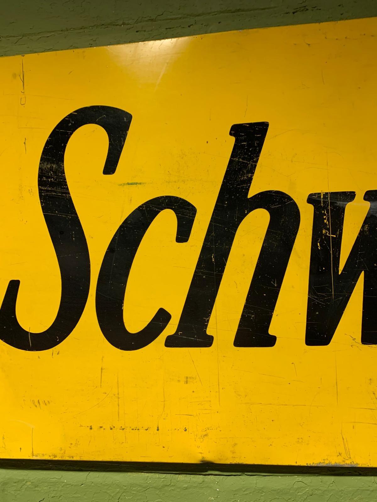 Metal Schweppes sign