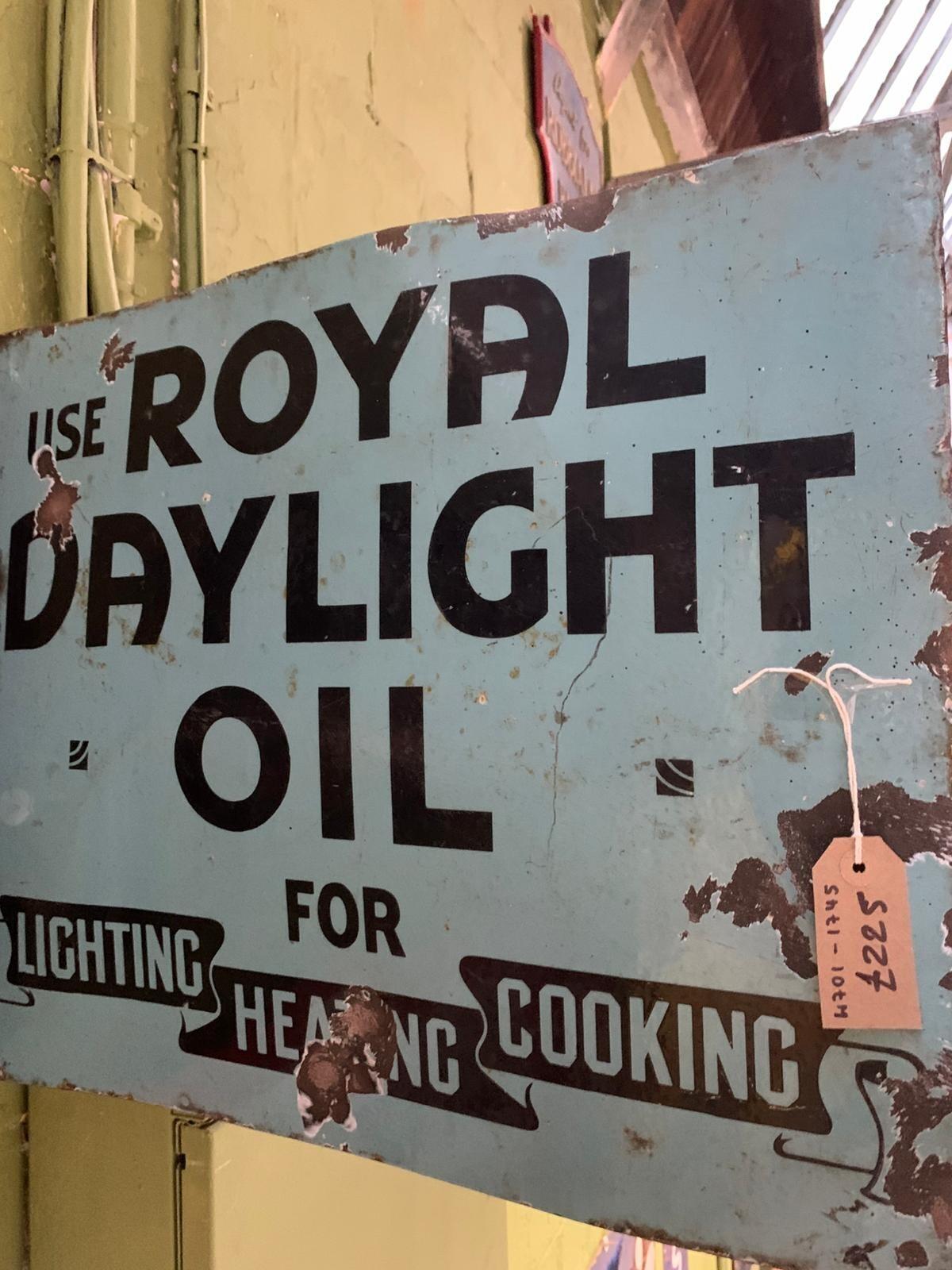 Blue metal Royal Daylight Oil sign