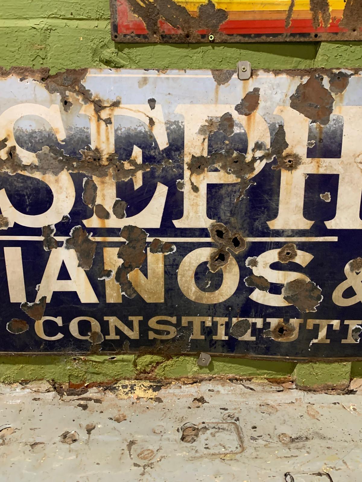 Metal Joeseph Riley sign