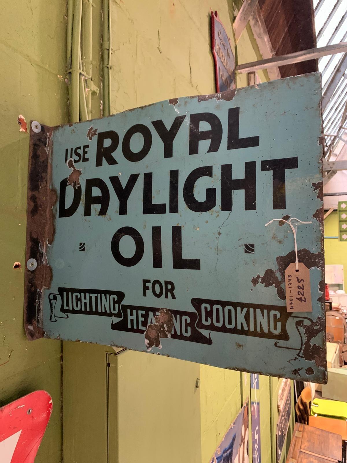 Blue metal Royal Daylight Oil sign