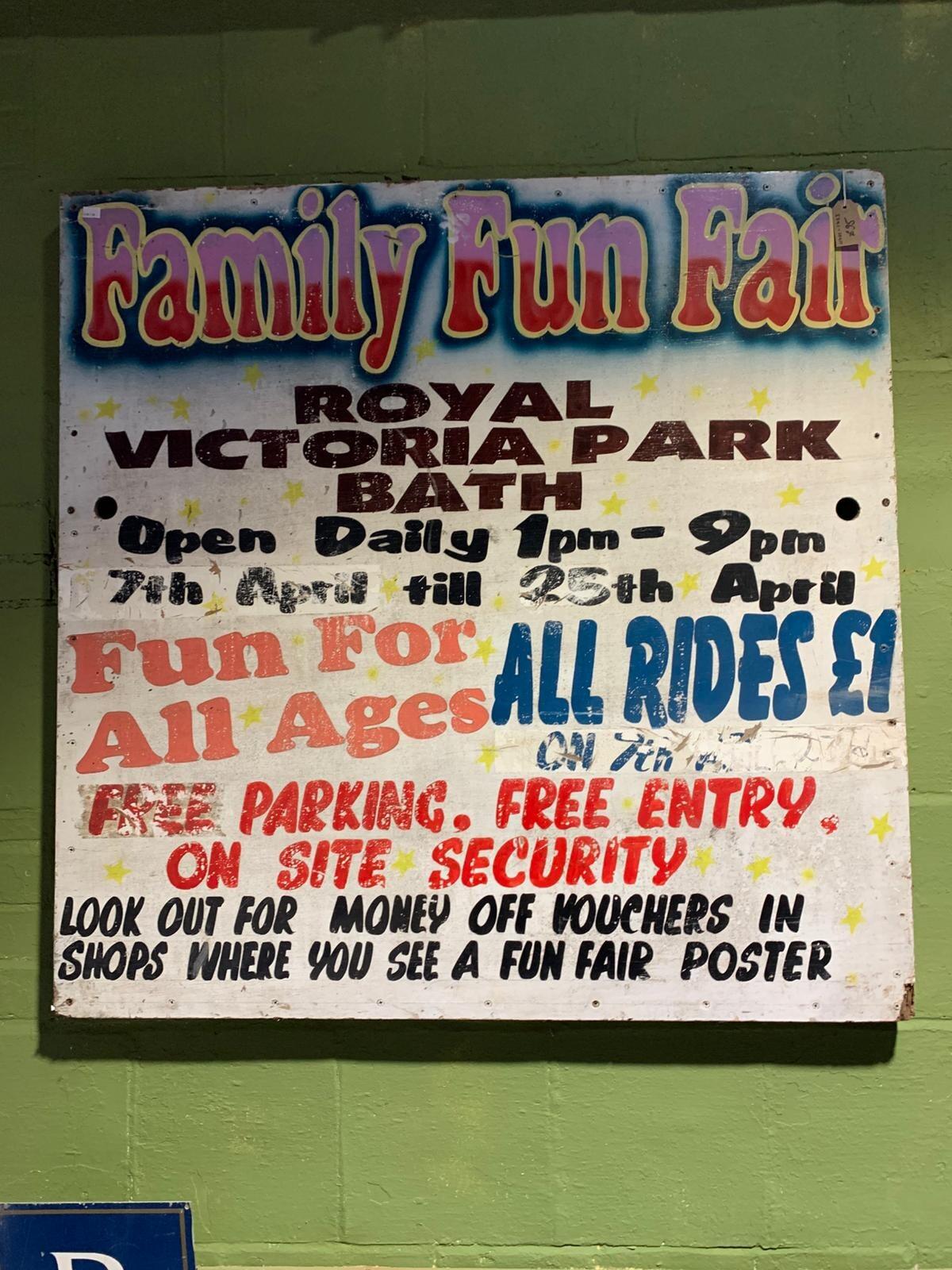 Metal family fun fair sign