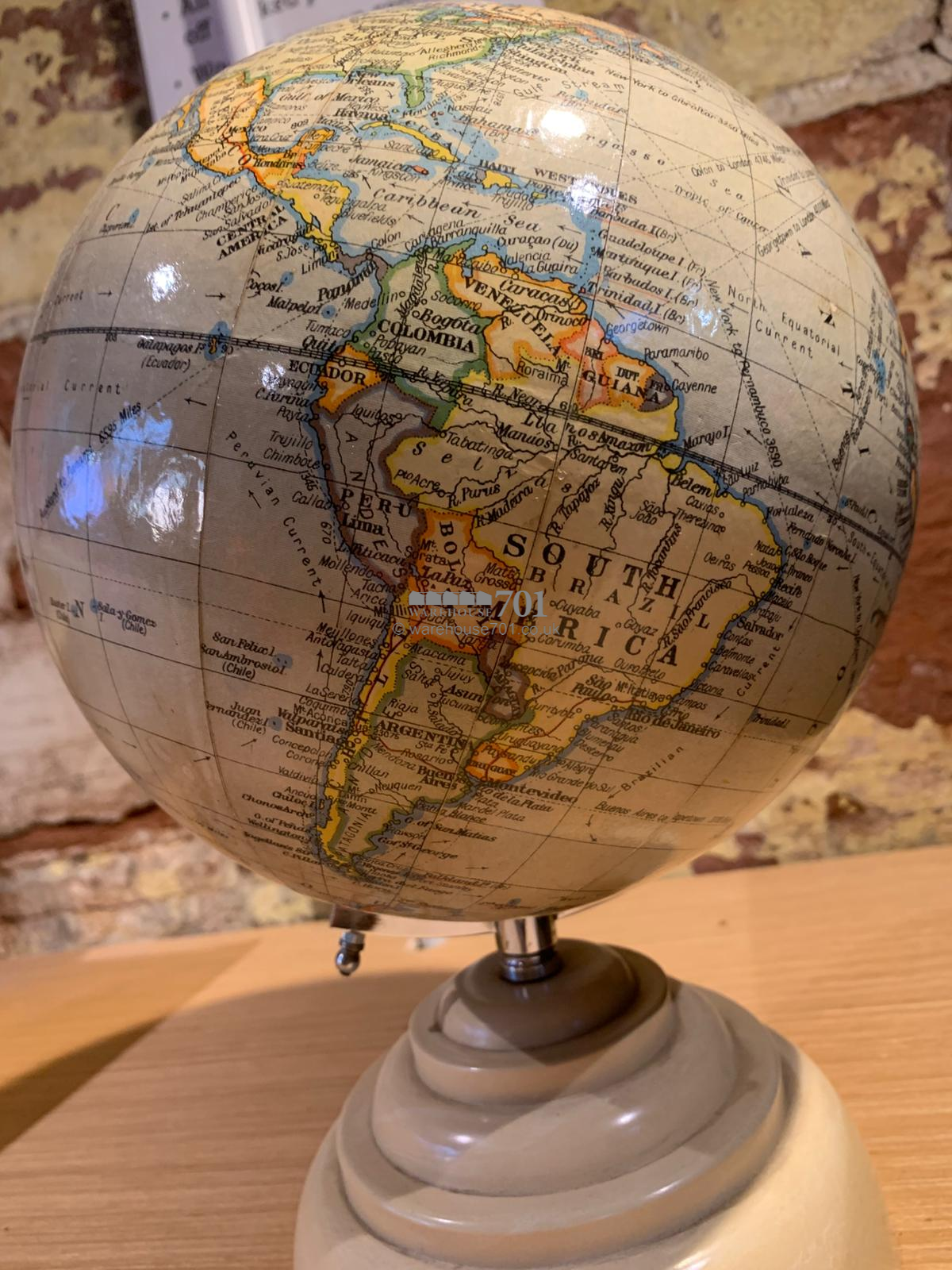 1940 8-inch chrome globe on a Bakelite base