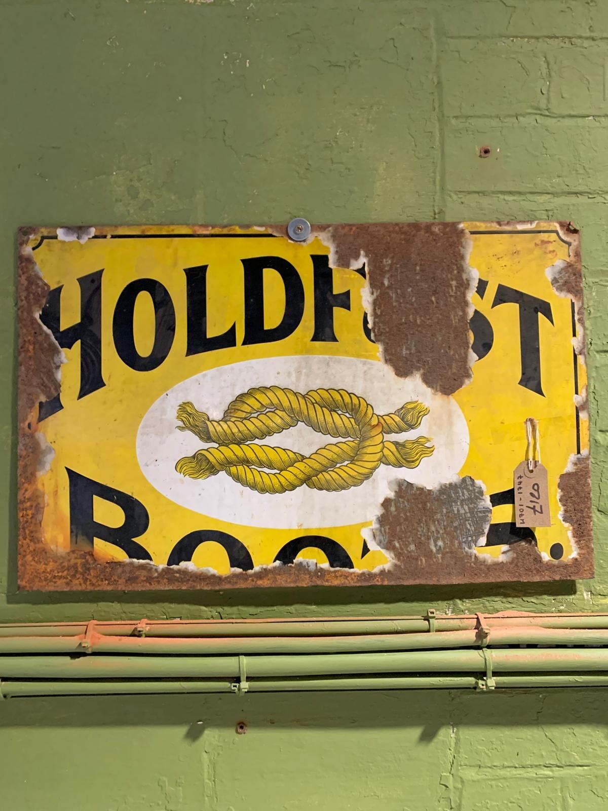 Metal Holdfast boots sign