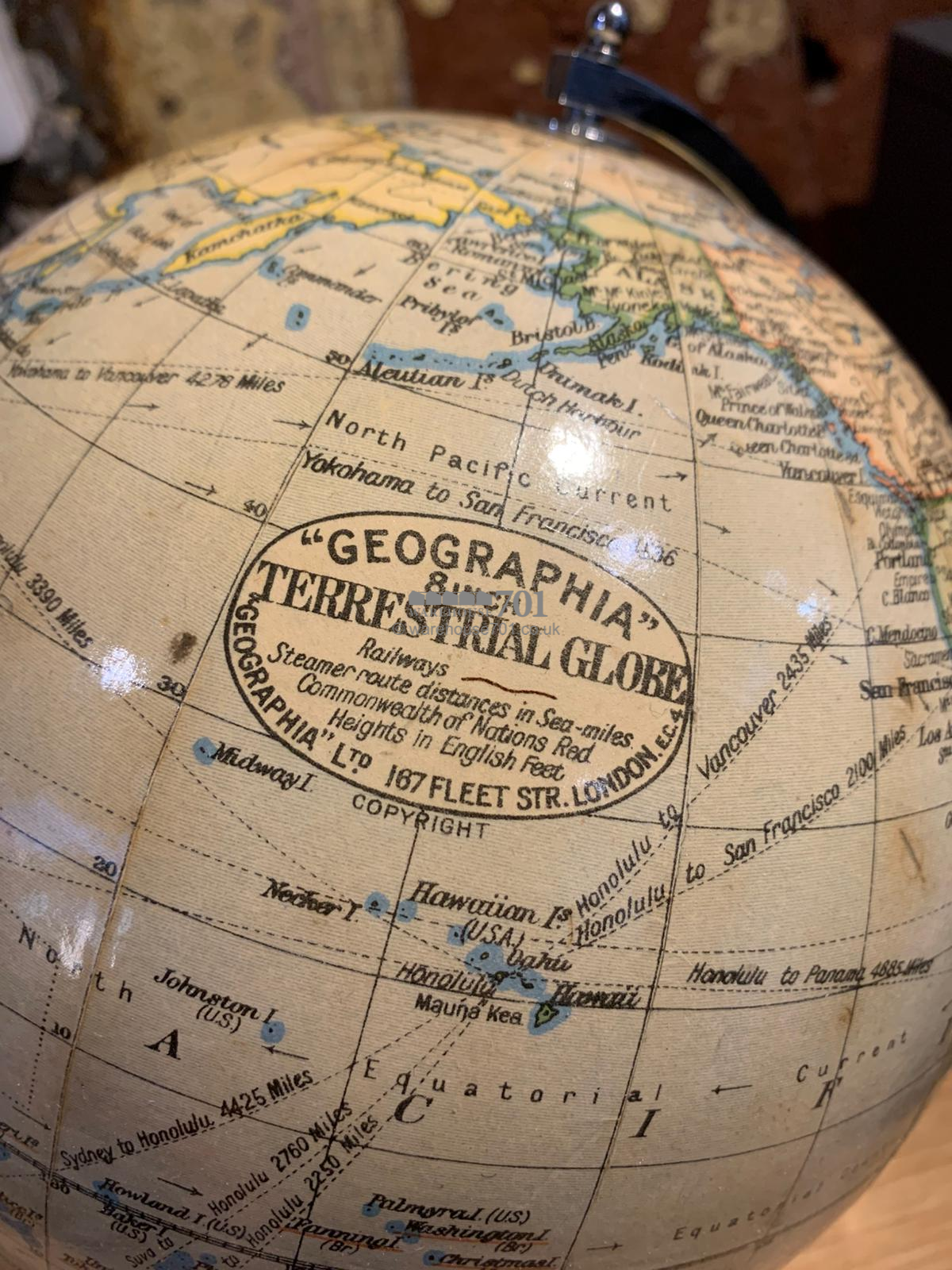 1940 8-inch chrome globe on a Bakelite base