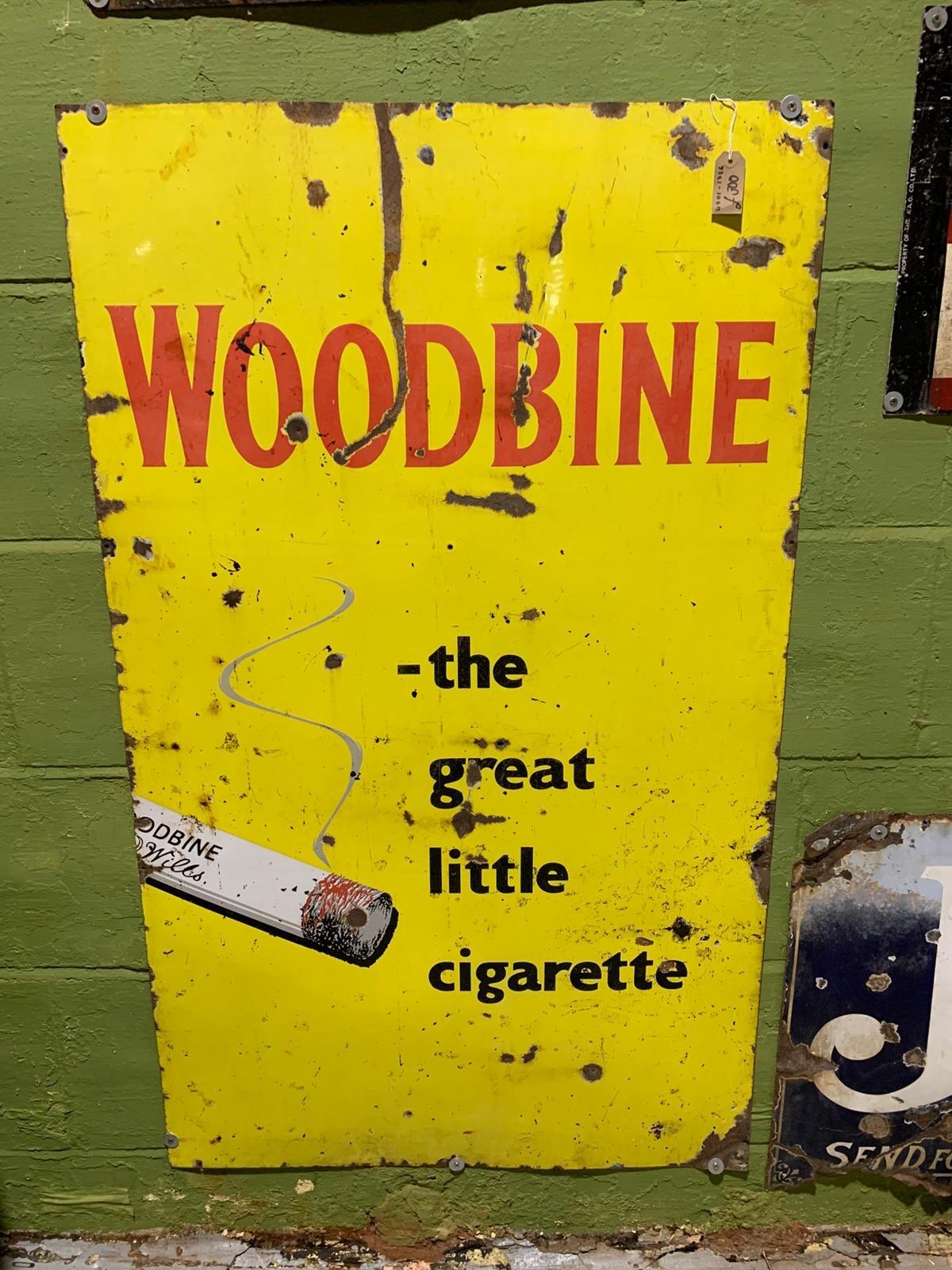 Yellow woodbine metal sign