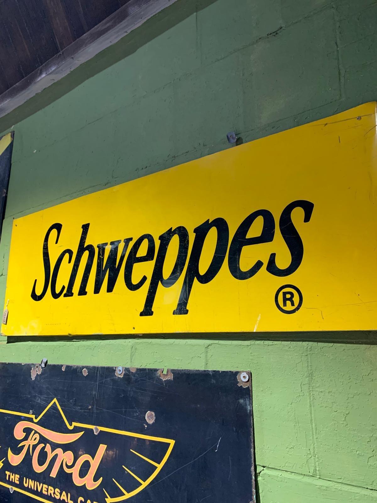 Metal Schweppes sign