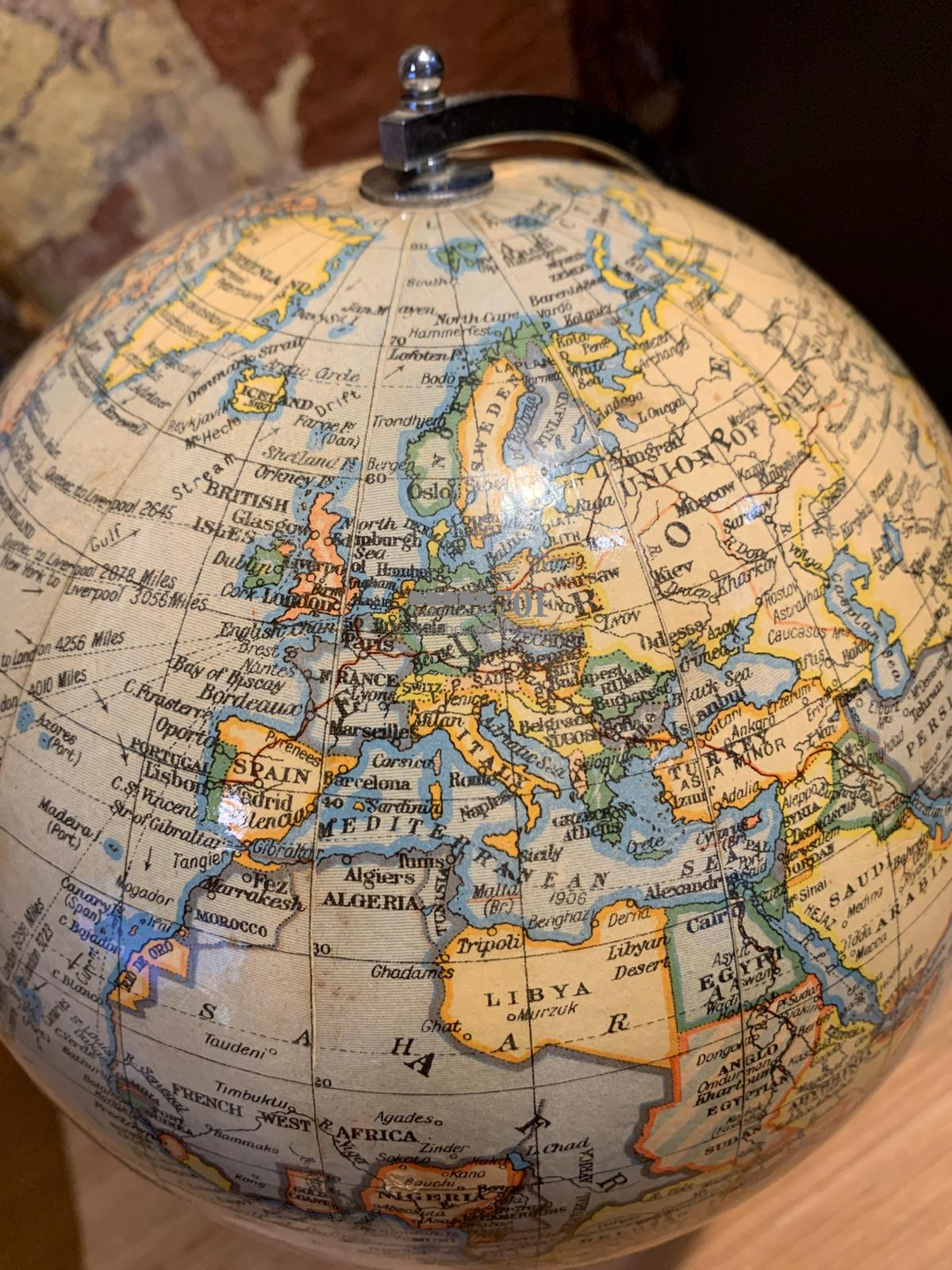 1940 8-inch chrome globe on a Bakelite base