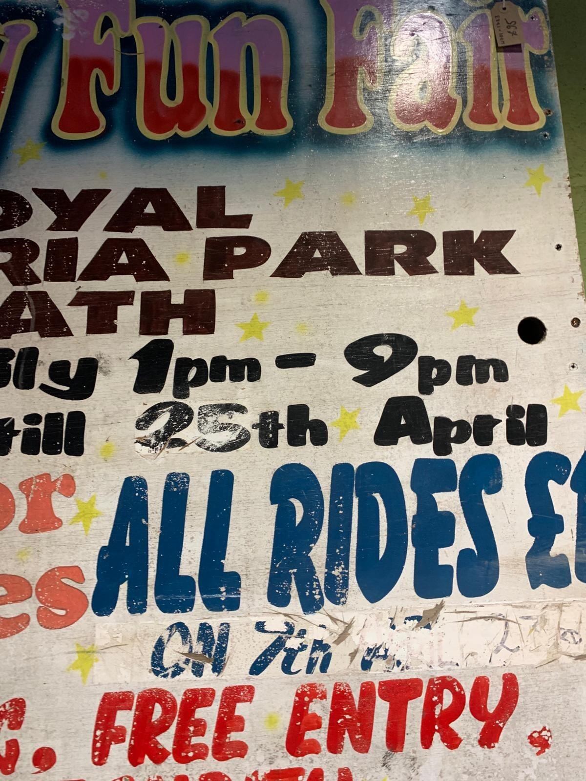 Metal family fun fair sign