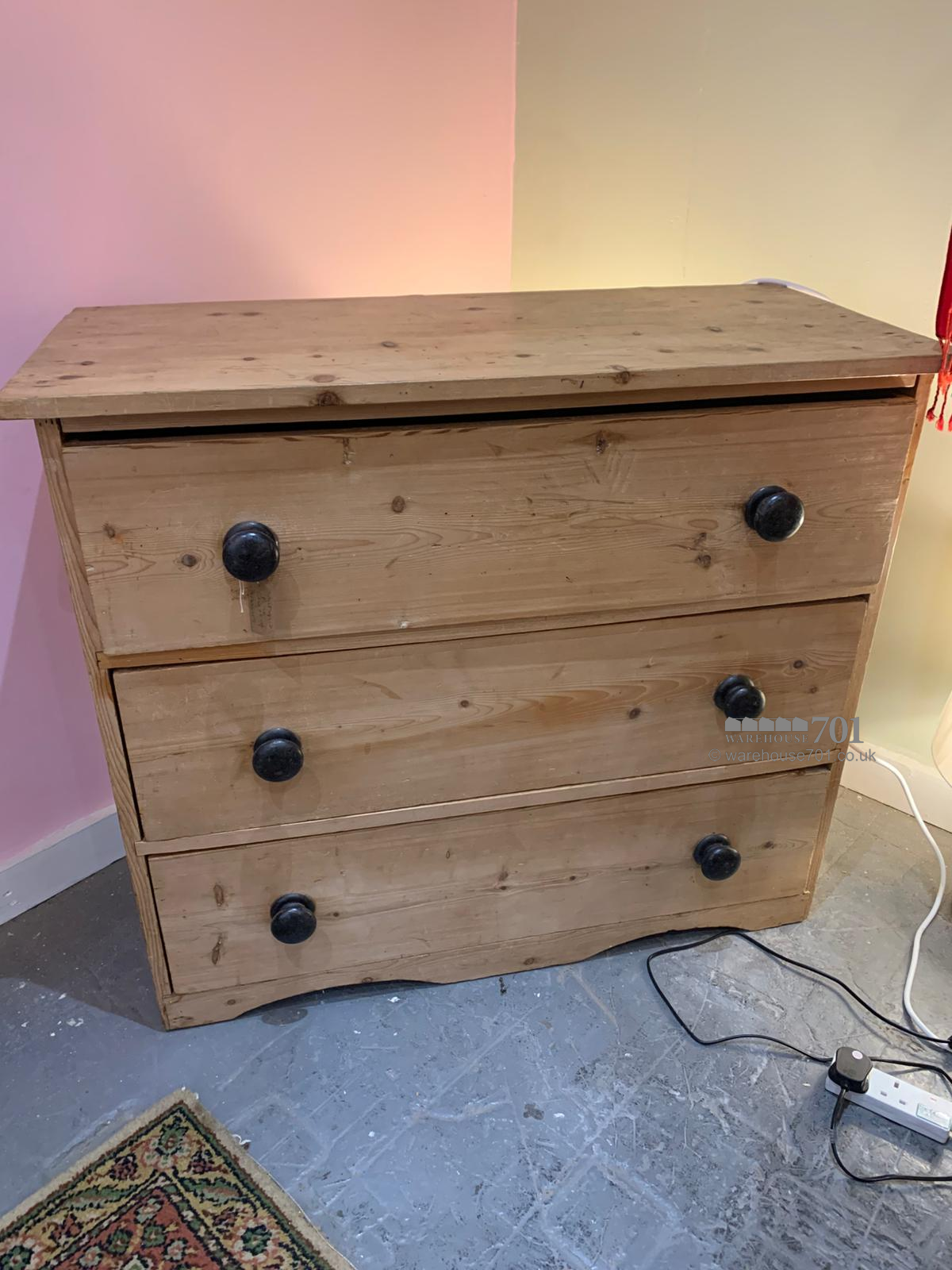 Antique pine chest of drawers with black handles