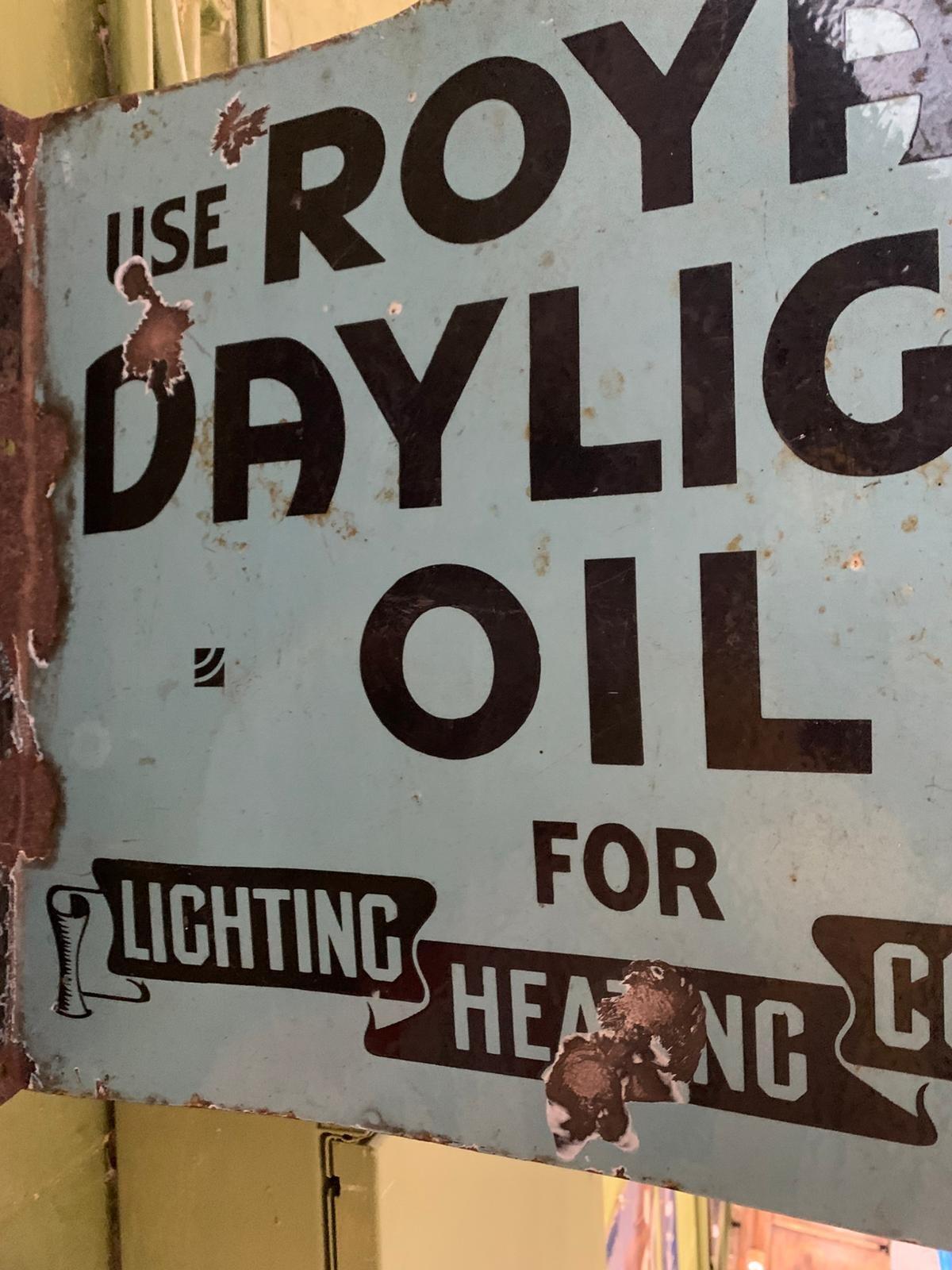 Blue metal Royal Daylight Oil sign
