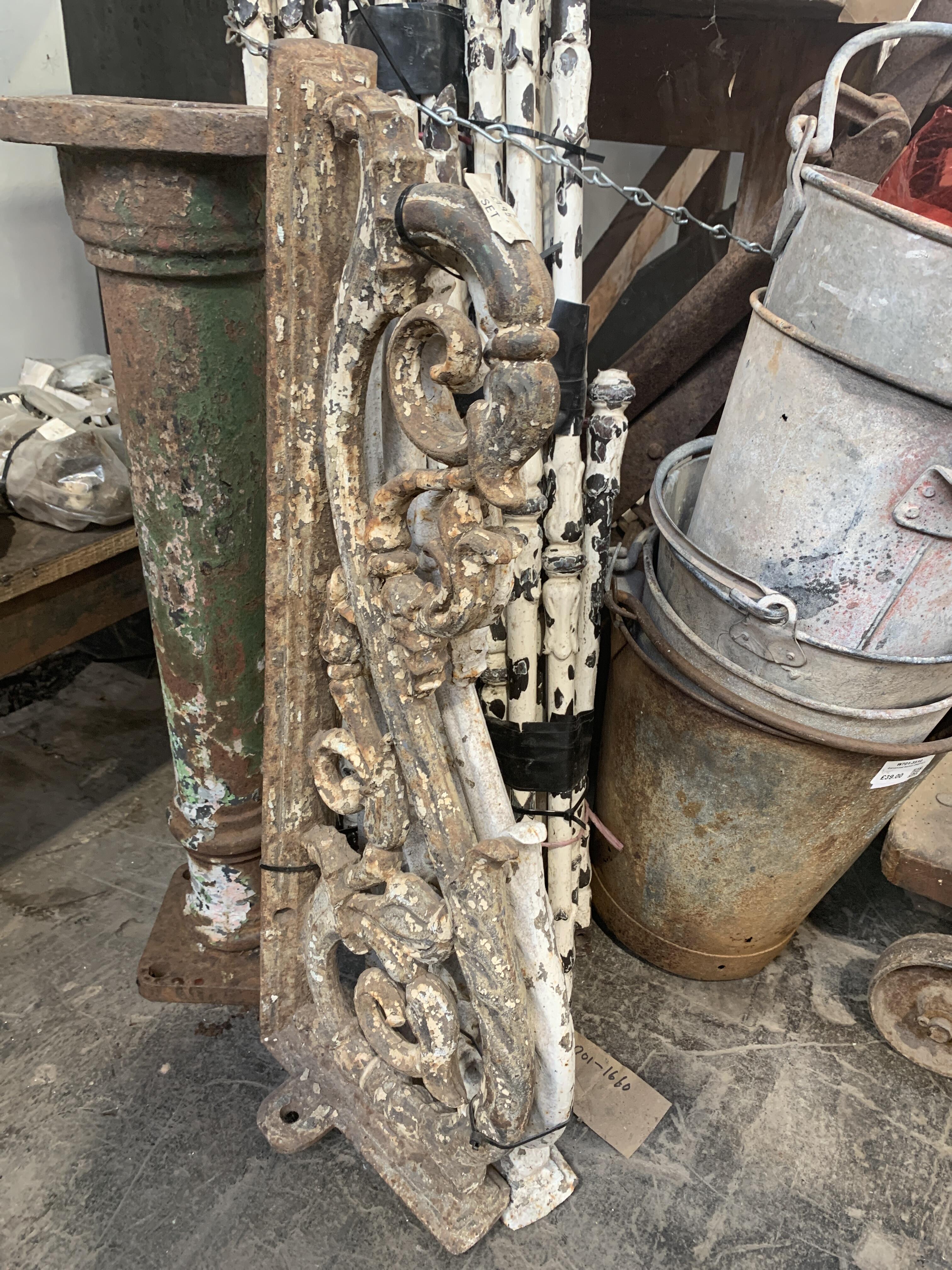 Pair of White Cast Iron Ornamental Brackets