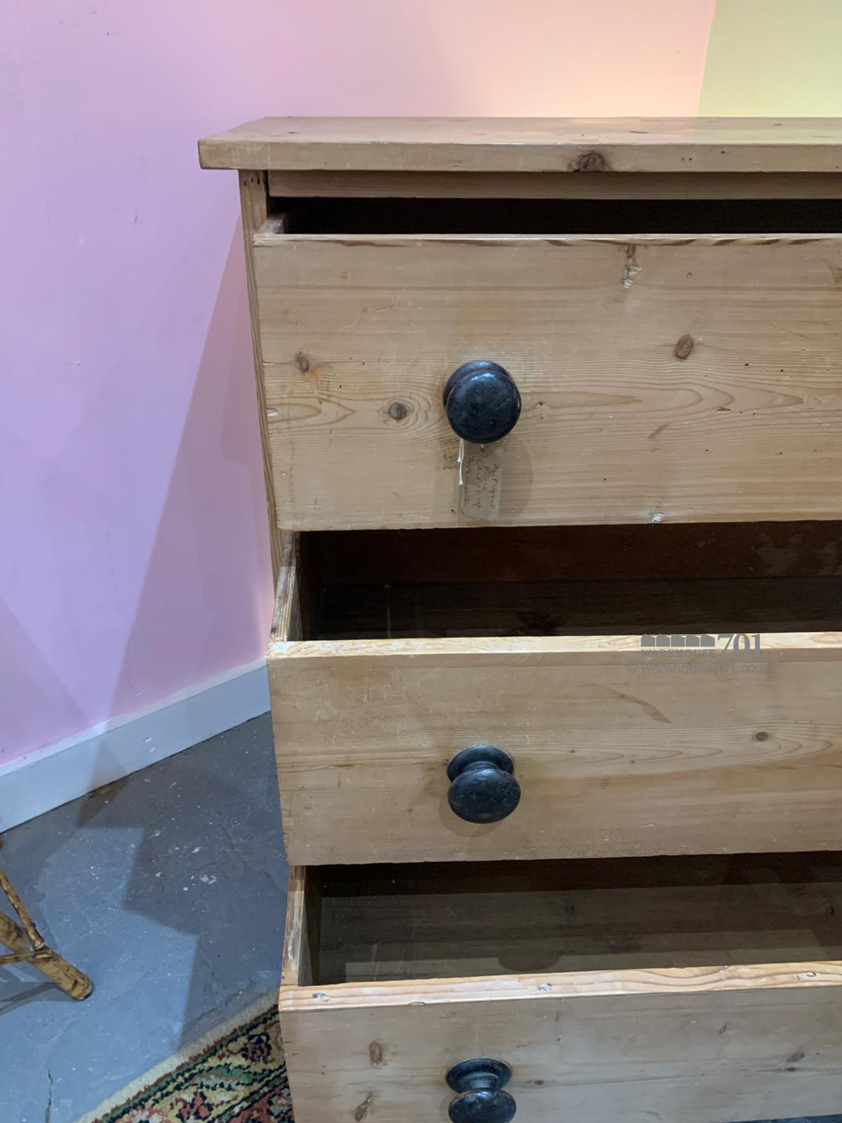 Antique pine chest of drawers with black handles