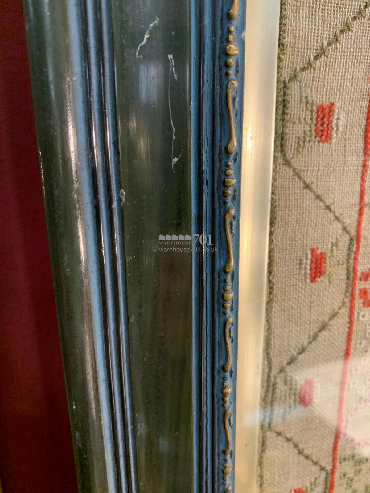 Alphabet sampler framed and glazed with a starwberry border - 1817