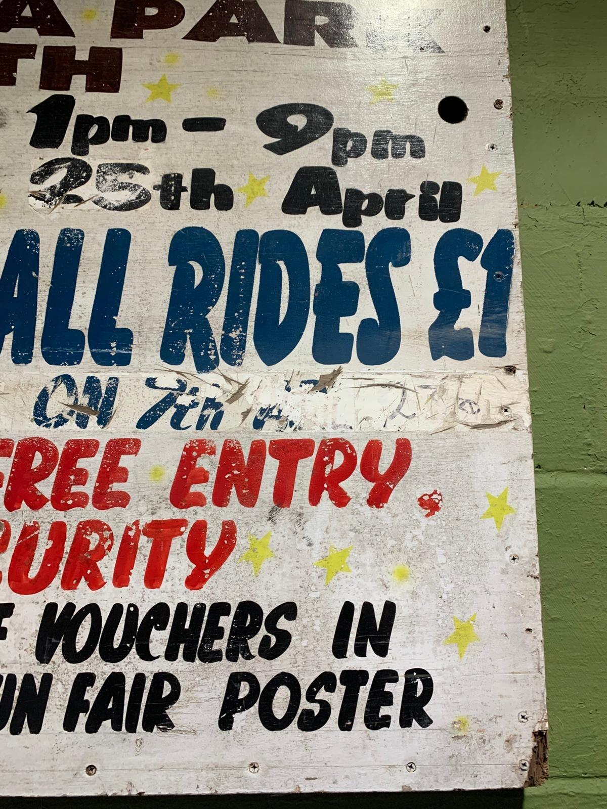 Metal family fun fair sign
