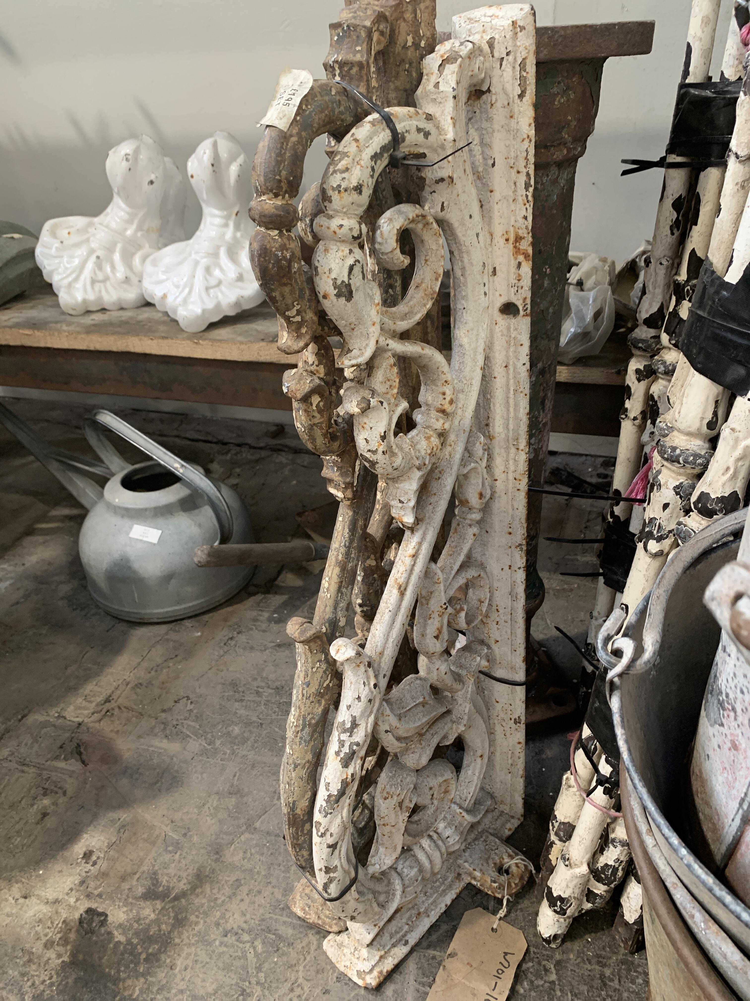 Pair of White Cast Iron Ornamental Brackets