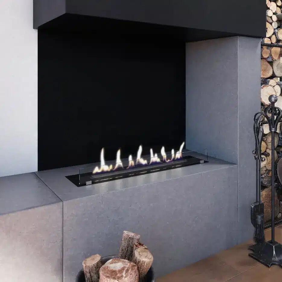 Denver F3 bio-ethanol burner lit in a charcoal fireplace opening