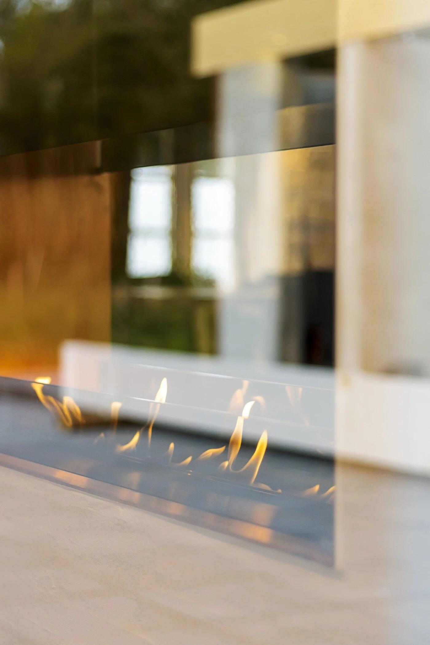 Montreal Vue flames seen through the tall glass panel