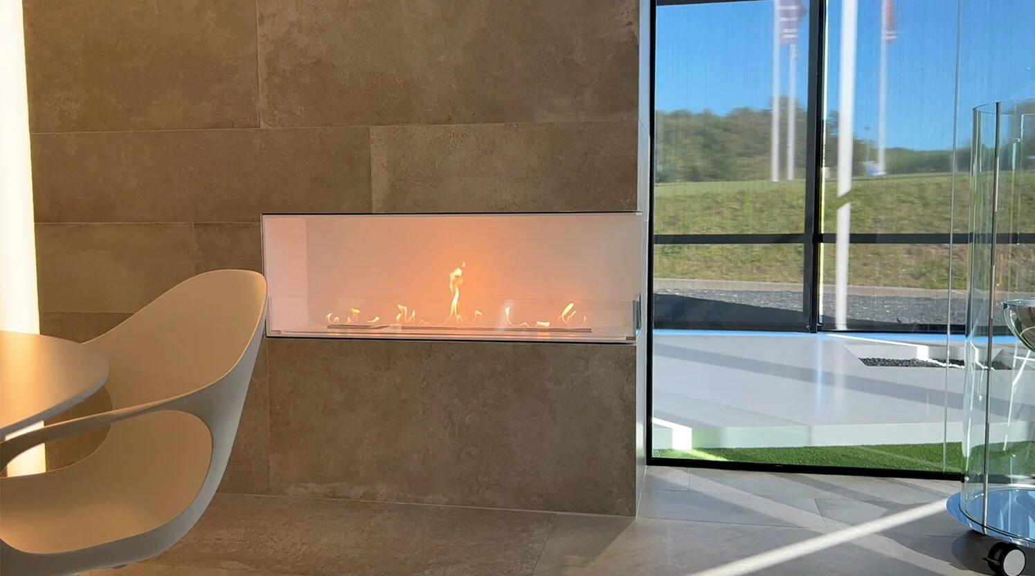 Montreal corner fire in a stone wall beside floor-to-ceiling windows