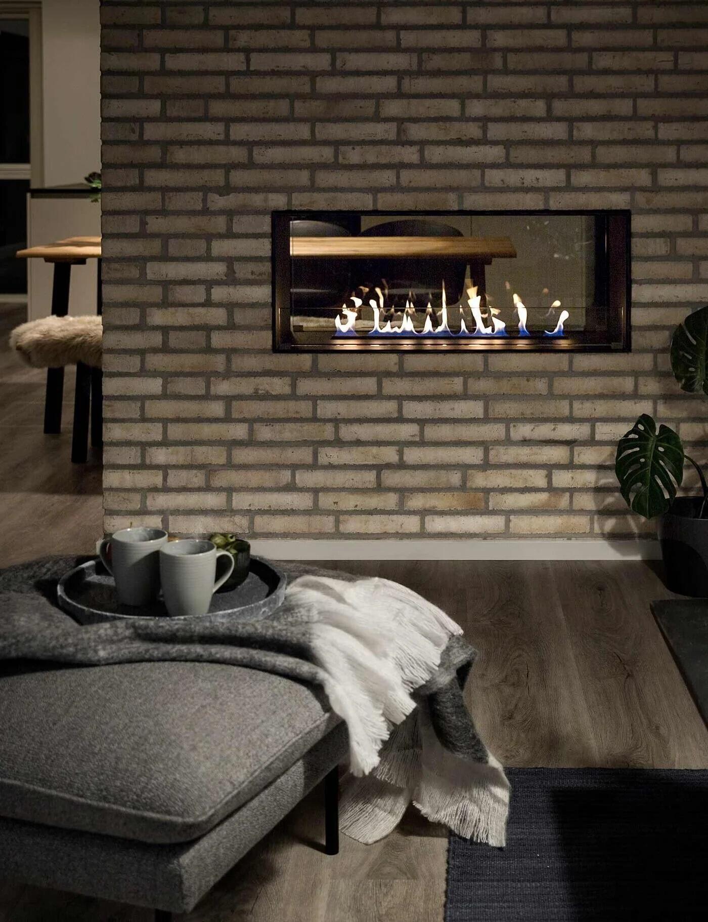 Montreal tunnel fire in an exposed brick wall above a grey day bed