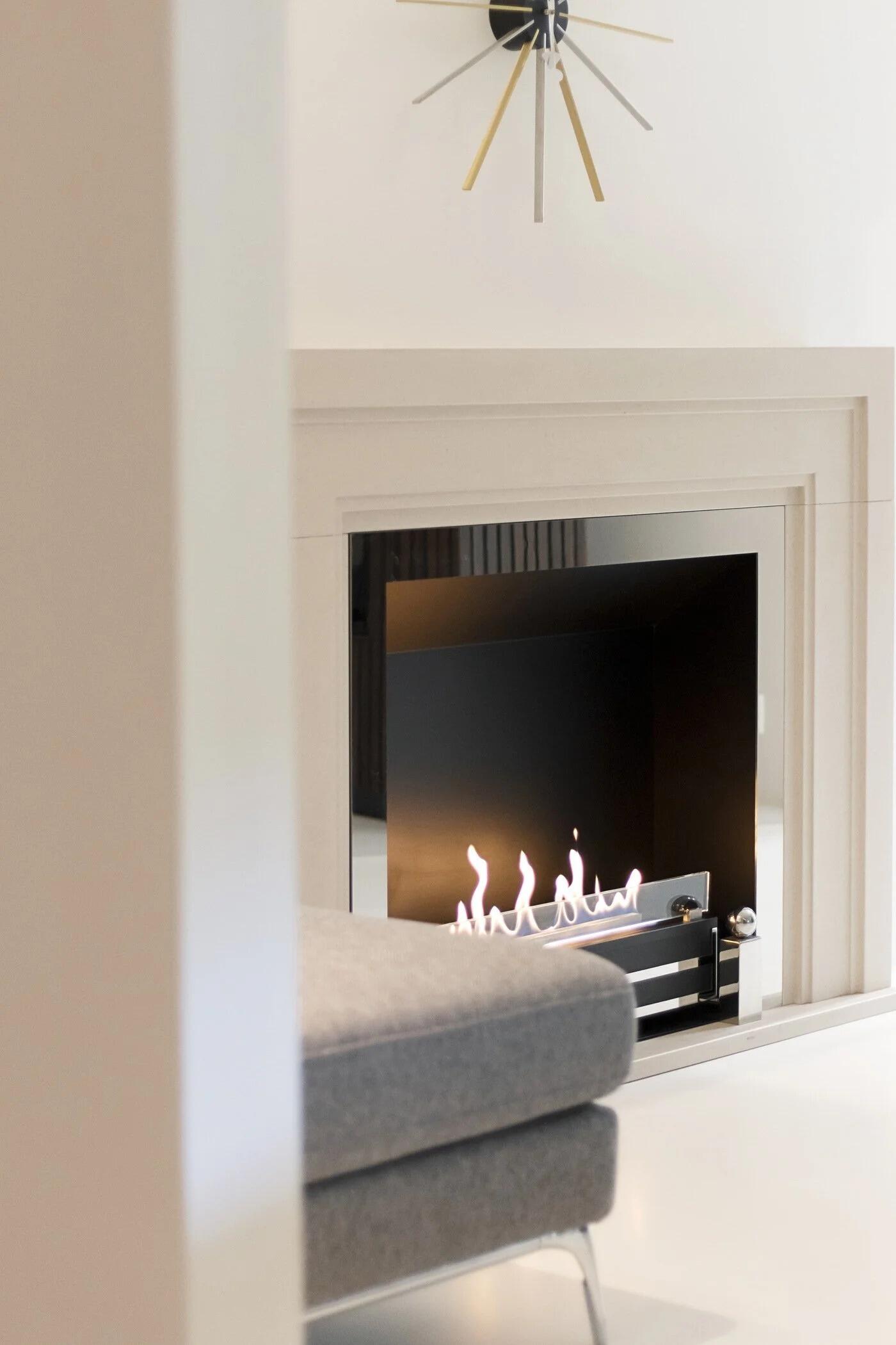 Side view of a Westminster fire in a white room