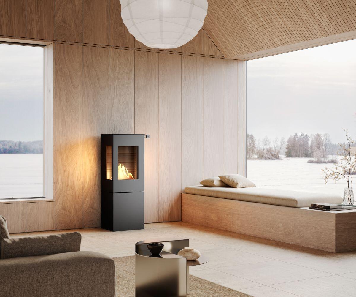 Rais Nexo 120 Bio bioethanol stove beside a window seat under a wooden ceiling