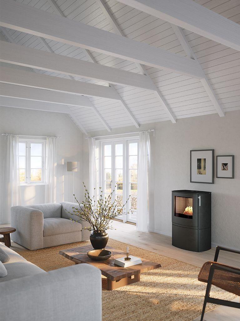 Rais Q-Tee 2 C Bio curved bioethanol stove in black in a white beamed living room