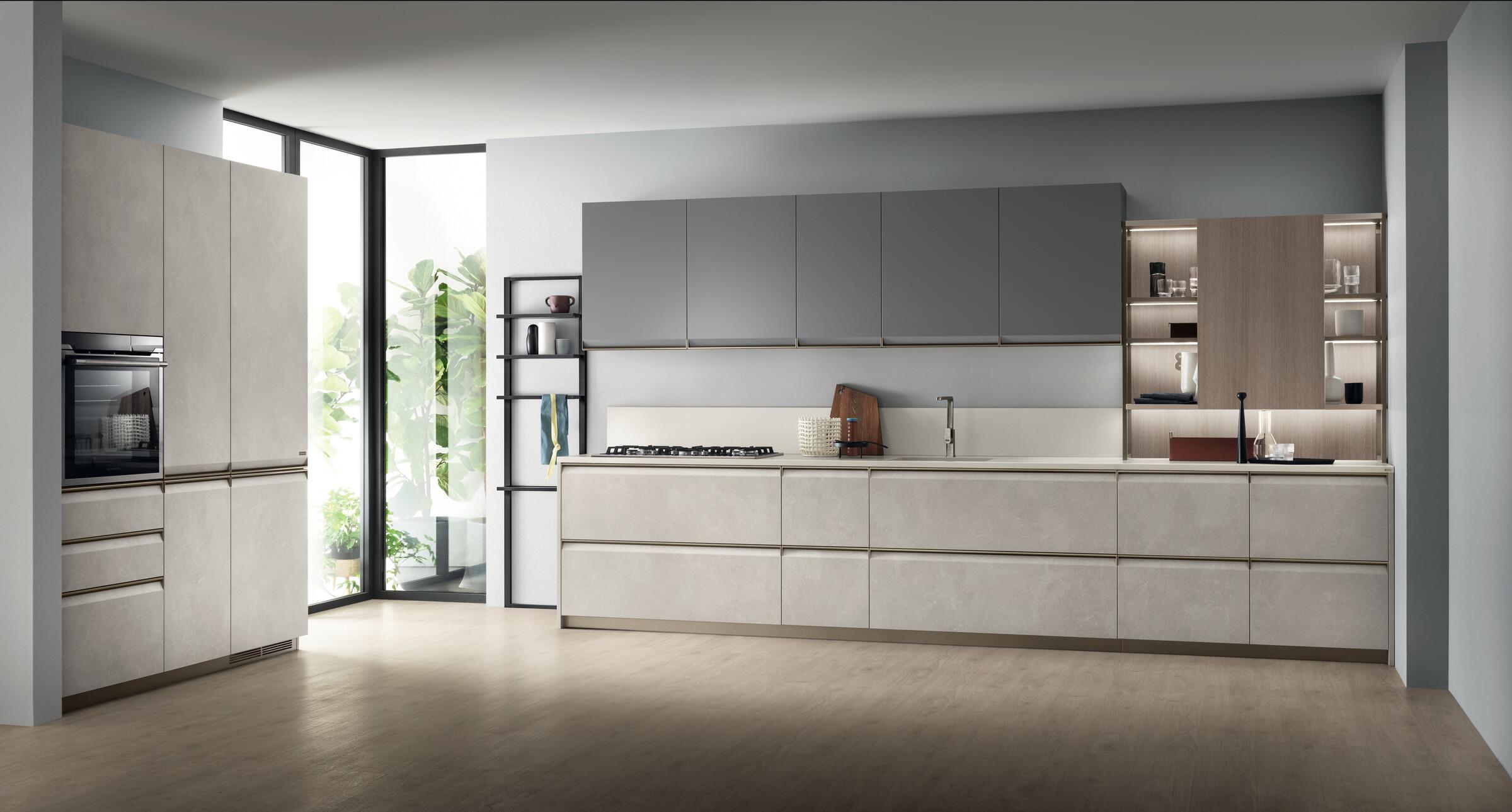 Scavolini Formalia kitchen in pale grey with a slim island and tall larder units