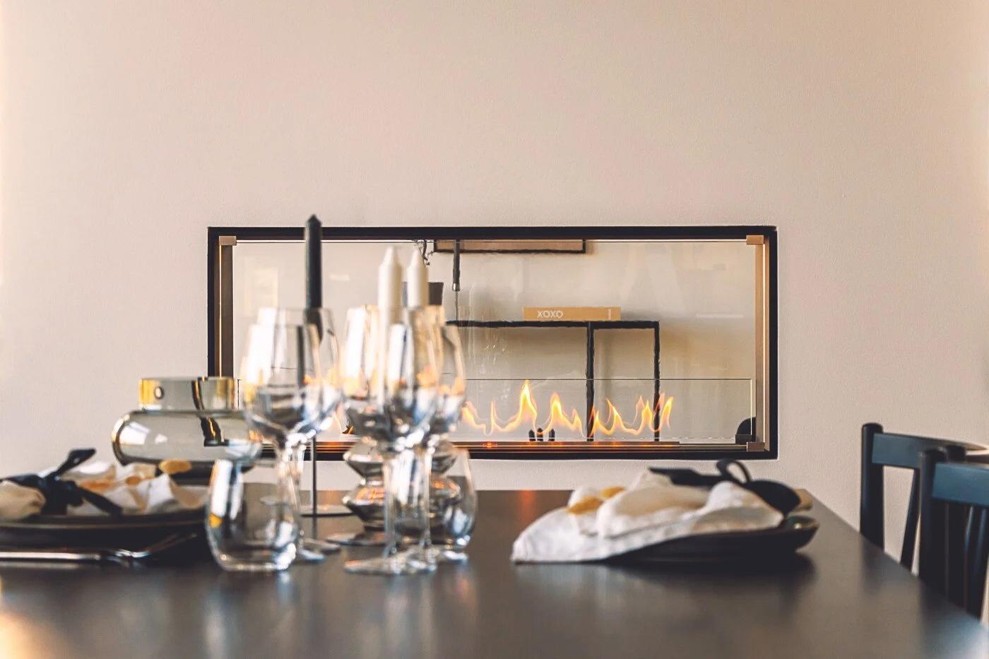 Montreal tunnel fire viewed across a dining table with glassware